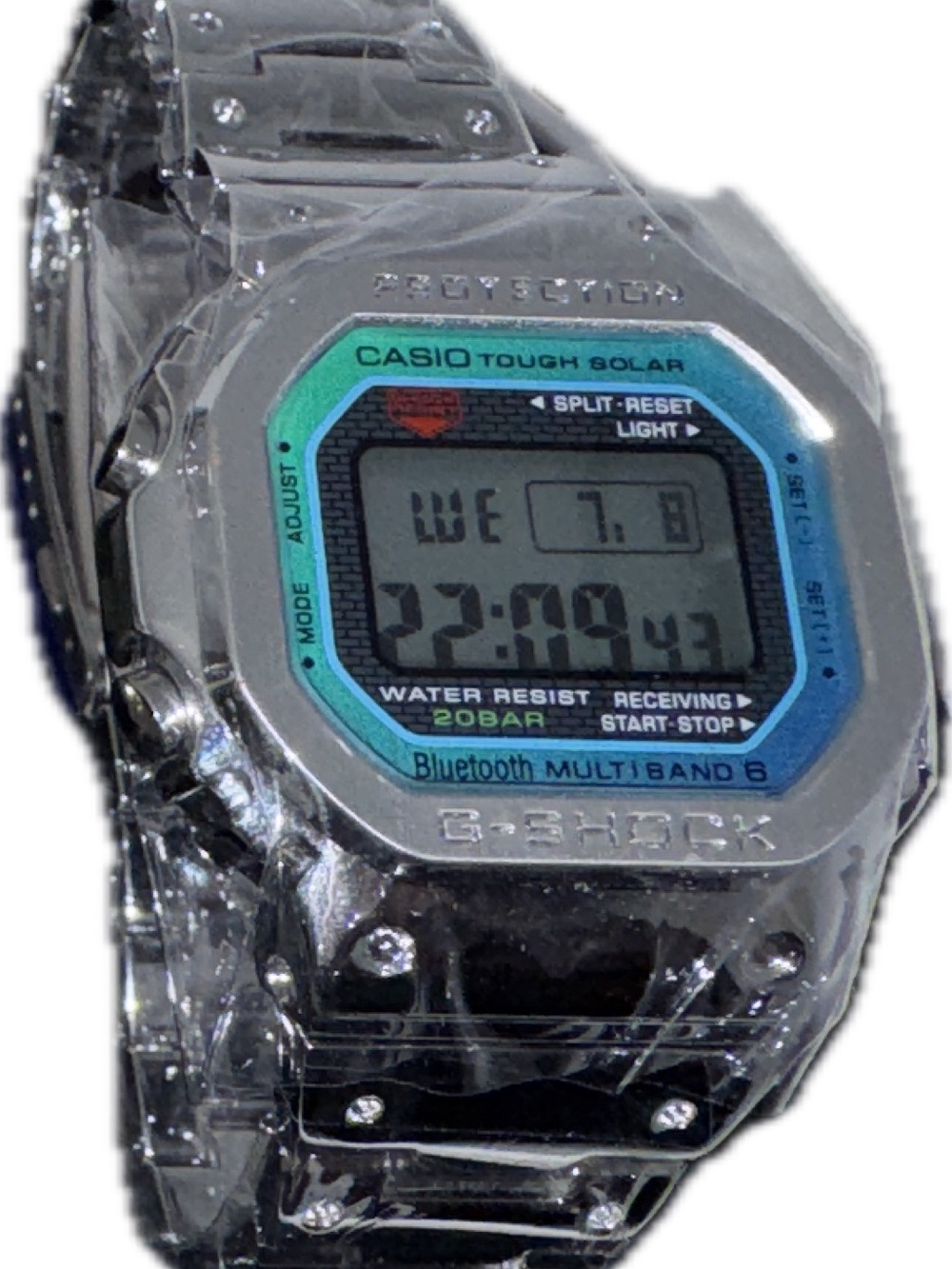 Casio Silver Digital Watch with Blue-Green Bezel